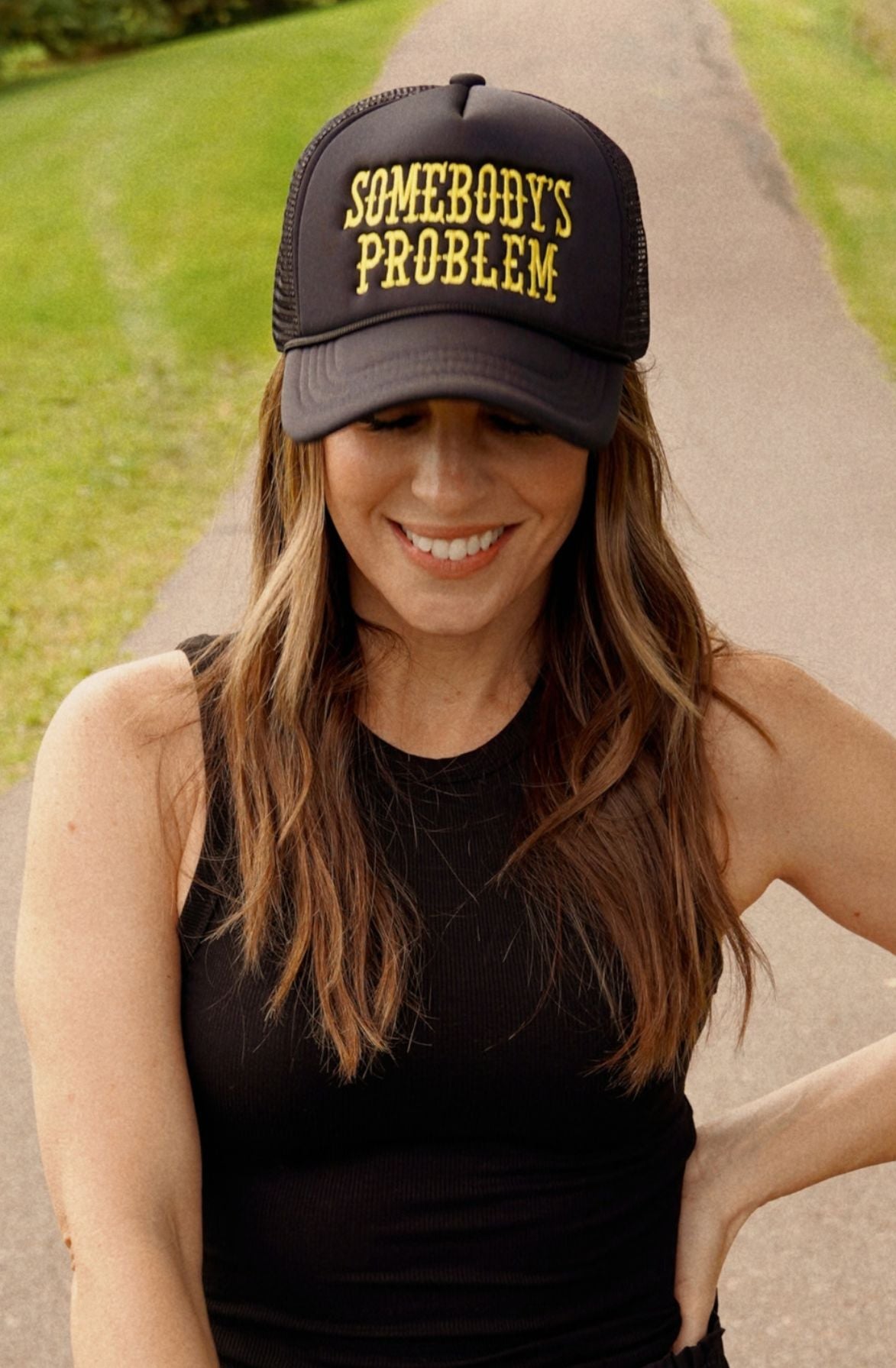 Somebody’s Problem Trucker Hat