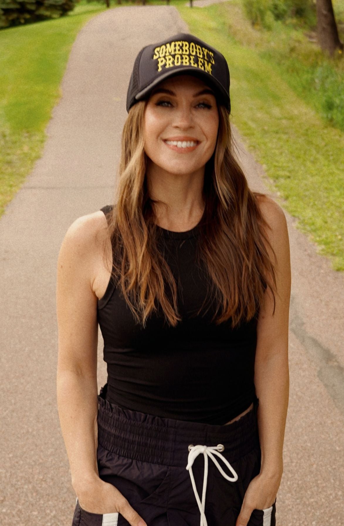 Somebody’s Problem Trucker Hat